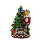 Nutcracker By Tree Glass Ornament
